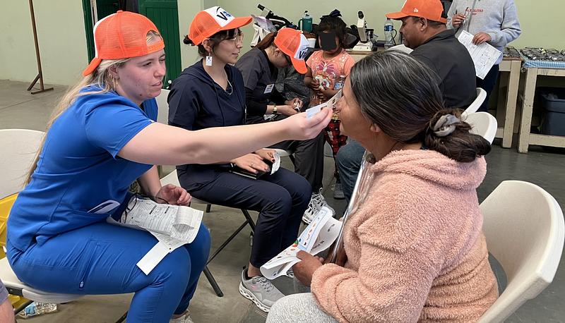 Volunteers working with patients in the field